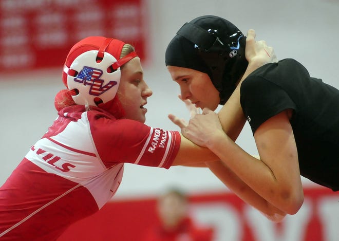 Rancocas Valley's Hailey Long, left, tangles with Kingsway's Rebecca Brown in their 111-pound match Monday.

[SCOTT ANDERSON / PHOTOJOURNALIST]