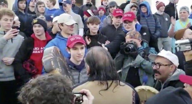 Parents of Covington Catholic School students say their children did nothing wrong, but many who have viewed a viral video disagree. [SURVIVAL MEDIA AGENCY VIA THE ASSOCIATED PRESS]