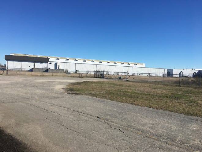 The former U.S. Marine facility in Navassa is under contract to a new owner, according to real estate listings. Brunswick County Commissioners will vote Tuesday to support a $700,000 building reuse grant to overhaul the site for a manufacturing facility that could bring 240 jobs to the county. [ADAM WAGNER/STARNEWS]