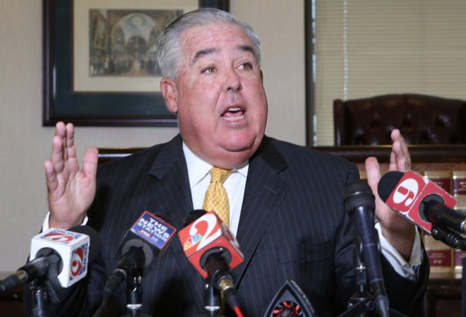 Orlando attorney John Morgan said Tuesday he is moving ahead with a ballot drive aimed at gradually raising Florida’s minimum wage to $15 an hour. [AP File]