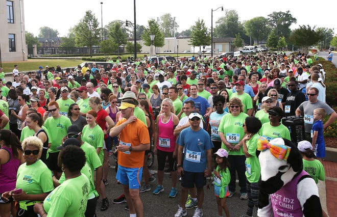 Runners gather at the start line for the 5k race at the 11th annual Tuscaloosa Mayor's Cup benefiting the Tuscaloosa Pre-K initiative held at Government Plaza on April 29, 2017. [Staff file photo/Erin Nelson]