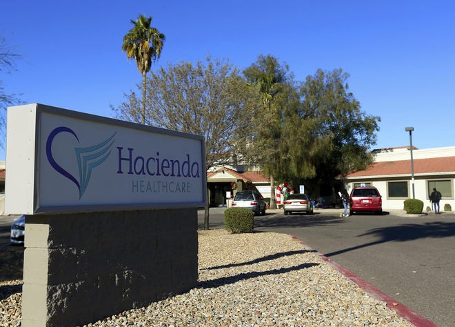 Two doctors who cared for an incapacitated woman who gave birth as a result of a sexual assault are no longer providing medical services at the long-term care center in Phoenix, Hacienda HealthCare said Sunday. [Ross D. Franklin/AP Photo]