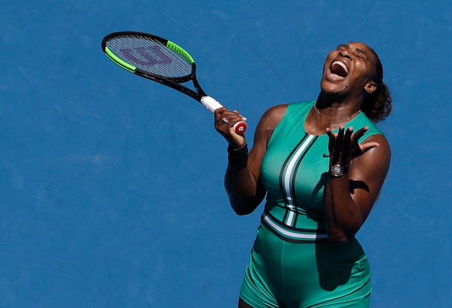 United States' Serena Williams reacts after losing a point to Karolina Pliskova of the Czech Republic during their quarterfinal match at the Australian Open tennis championships in Melbourne, Australia, Wednesday, Jan. 23, 2019. (AP Photo/Mark Schiefelbein)