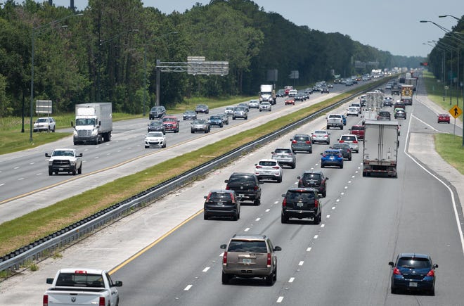 Vehicles travel on Interstate 95, north of International Golf Parkway in St. Johns County, in 2018. Plans are in place to widen parts of I-95 to create speed lanes beginning at International Golf Parkway through to Duval County and into downtown Jacksonville. The first section, at the intersection of I-295, is already open but the lanes in St. Johns County won't be completed until 2023. [PETER WILLOTT/THE RECORD]