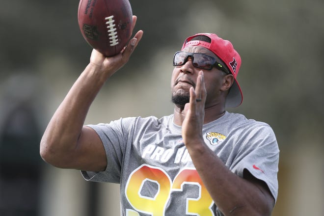 Jaguars defensive end Calais Campbell tosses a ball around at Pro Bowl practice Wednesday at ESPN Wide World of Sports. [Doug Benc/The Associated Press]