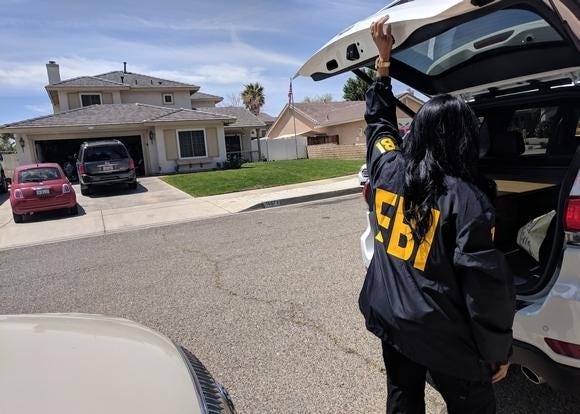 FBI personnel searched the home of former Adelanto Mayor Rich Kerr on May 8, 2018. [James Quigg, Daily Press]