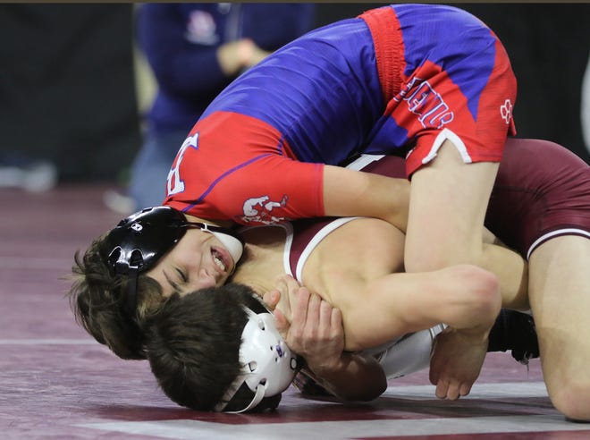 Burlington's Cameron Soda is in control for the moment, but would go on to lose to Timberlane's Nick Roeger in their 113 pound match in the George Bossi Lowell Holiday Wrestling Tournament Friday, Dec. 28, 2018, at the Tsongas Center at UMASS Lowell. [Wicked Local Staff Photo/Ann Ringwood]