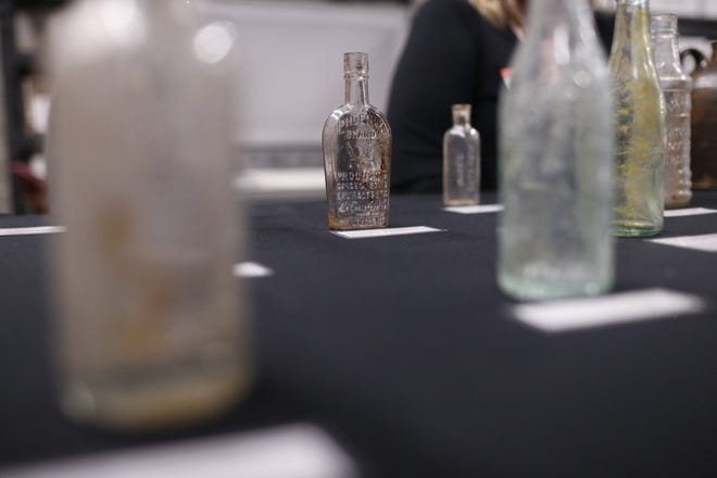 Artifacts recovered during the recent construction project on the East end zone of Sanford Stadium on display during a special open house at the new location at the University of Georgia's archaeology lab in Athens, Ga., on Friday, Jan. 18, 2019. [Photo by Joshua Jones/Athens Banner-Herald]