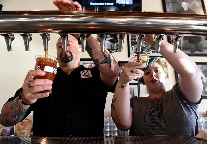 Tom Cimino, left, of Cherry Hill, assistant brewer and former firefighter, will help Zed's Beer release a special edition IPA on Saturday to benefit the victims of the California wildfire. [ARCHIVE PHOTO]