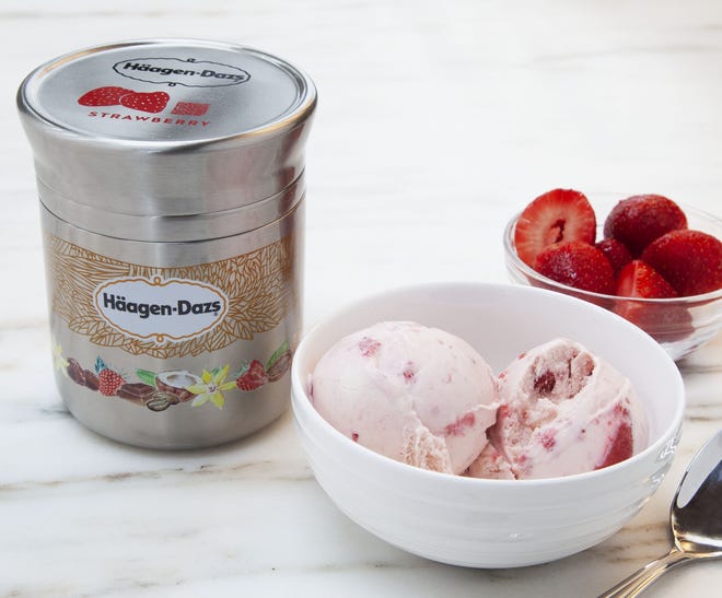 This photo shows Nestle's stainless steel Haagan-Dazs ice cream container designed for use with Loop. The new shopping platform announced at the World Economic Forum aims to change the way people buy many products, from food to personal-care and home products. Loop would do away with disposable containers for some name-brand products, including some shampoos and laundry detergents. Instead, those products would be delivered in sleek, reusable containers that will be picked up at your door, washed and refilled. [Chris Crane/AP Photo]