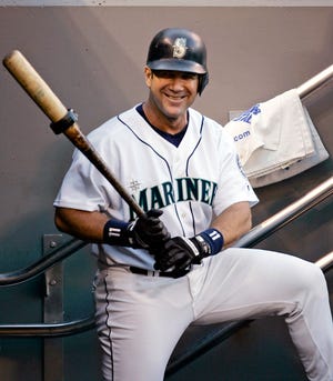 FILE - In this Oct. 2, 2004, file photo, Seattle Mariners designated hitter Edgar Martinez waits his turn to bat against the Texas Rangers, Saturday, Oct. 2, 2004, in Seattle. Martinez was elected to baseball's Hall of Fame Tuesday, Jan. 22, 2019. (AP Photo/Elaine Thompson, File)