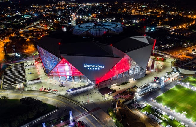FILE-In this Friday, Sep. 21, 2018, photo, Mercedes-Benz Stadium is seen in this aerial photo in Atlanta. The stadium will be the site of Super Bowl LIII on Sunday, Feb. 3, 2019. Legions of police and federal agents will be protecting the stadium as Atlanta hosts Super Bowl 53, but recent attacks in the U.S. and around the world underscore how terrorists are striking less-secure areas outside sports stadiums, arenas and airports, experts say.(AP Photo/Danny Karnik, File)