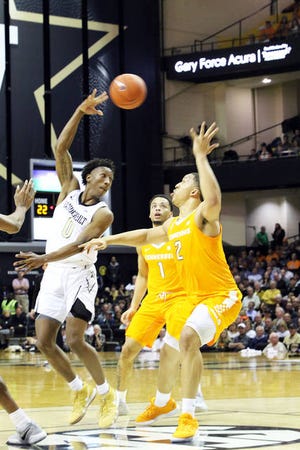 Tennessee’s Grant Williams (2) and Lamonte’ Turner defend against Vanderbilt’s Saben Lee during Wednesday’s Southeastern Conference matchup at Memorial Gym. (Photo by correspondent Rob Fleming)