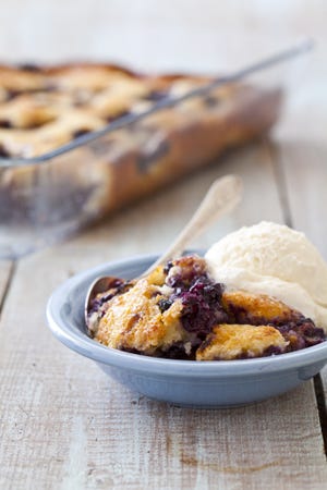 You could use blueberries or peaches in this cobbler that's inspired by the Texas Hill Country. [Contributed by America's Test Kitchen]