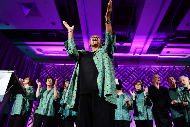 Elise Bryant, director of the D.C. Labor Chorus, leads the group in a rehearsal as they prepare to perform at a prayer breakfast for the AFL-CIO Martin Luther King Jr. Civil and Human Rights Conference at the Washington Hilton on Sunday, Jan. 20, 2019. [Washington Post photo by Matt McClain]