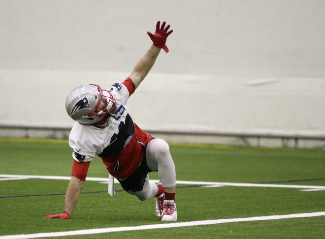 New England Patriots wide receiver Julian Edelman warms up during an NFL football practice, Thursday, Jan. 24, 2019, in Foxborough, Mass. The Los Angeles Rams are to play the New England Patriots in Super Bowl 53 on Feb. 3, in Atlanta, Ga. (AP Photo/Steven Senne)