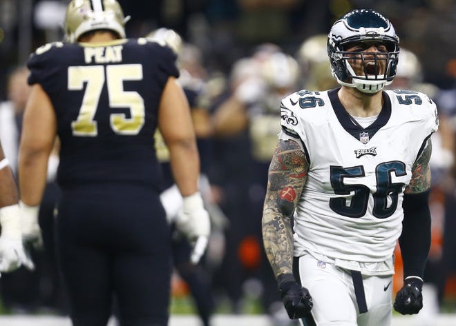 Eagles defensive end Chris Long celebrates making a play in the NFC divisional playoff loss to the Saints. [BUTCH DILL / THE ASSOCIATED PRESS]