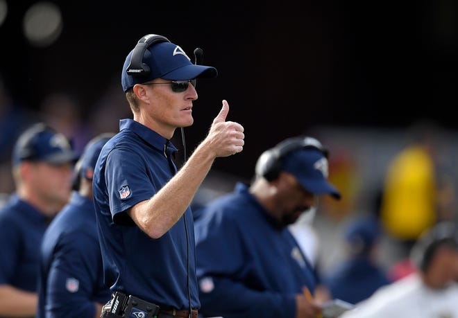FILE - In this Dec. 10, 2017, file photo, Los Angeles Rams special teams coordinator John Fassel gestures during an NFL football game against the Philadelphia Eagles, in Los Angeles. Fassel's fingerprints were all over the Rams' NFC championship game victory, from the fake punt to the 57-yard winning field goal. Los Angeles' peerless special teams coordinator isn't saying whether he's cooking up something for the Super Bowl, but Fassel's units are a major part of the Rams' success. (AP Photo/Mark J. Terrill, File)