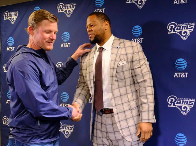 The offseason addition of defensive tackle Ndamukong Suh (left) was among the keys for the Los Angeles Rams and seventh-year general manager Les Snead making a run to their first Super Bowl appearance since their loss to the New England Patriots following the 2001 season. (Richard Vogel/The Associated Press)
