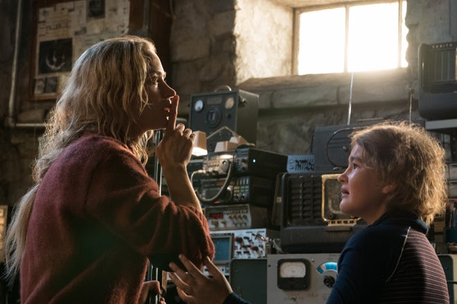 Emily Blunt, left, and Millicent Simmonds play characters who can't make noise in "A Quiet Place." [JONNY COURNOYER/PARAMOUNT PICTURES]