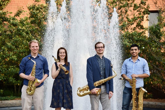 Nicki Roman, second from left, is a graduate of the University of North Florida. Her Fuego Saxophone Quartet performs at the school on Sunday. [Photo by Allison Chenard]