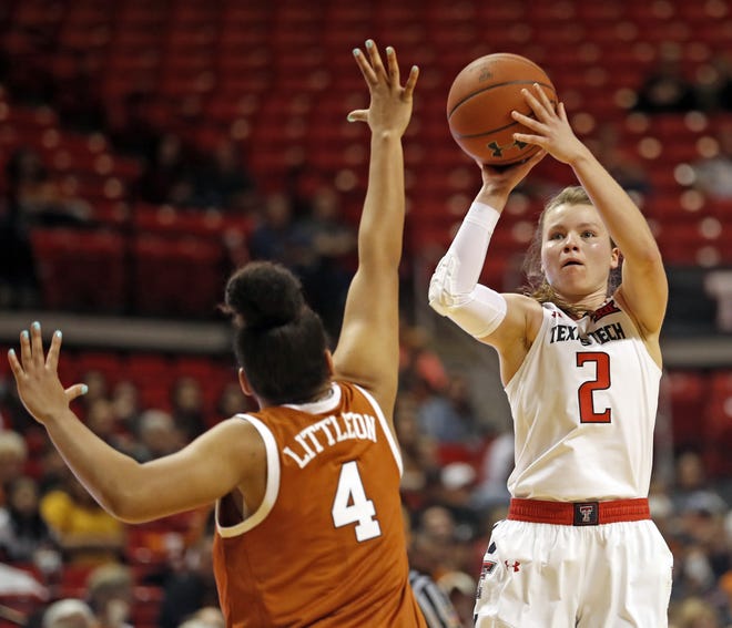 Texas Tech's Sydney Goodson (2) shoots the ball over Texas' Destiny Littleton (4) during the game against Texas, Saturday, Jan. 26, 2019, at United Supermarkets Arena in Lubbock, Texas. [Brad Tollefson/A-J Media]