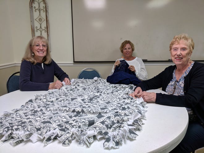 St. Margaret of Scotland Episcopal Church crafters Fran Evans, Jane Slaughter and Carol Vos finish lap blankets to be blessed and distributed to cancer patients. Crafters meet every third Wednesday at 1 p.m. at St. Margaret of Scotland Episcopal Church, 8700 Clark Road, in Sarasota. For more information, call 941-925-2525. All are welcome! [PROVIDED PHOTO]