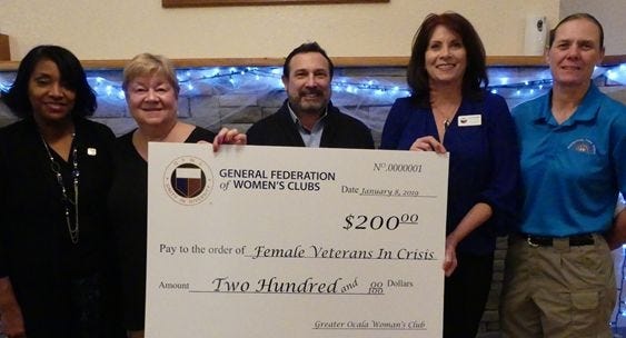 Shown during the January GFWC Greater Ocala Woman's Club meeting, from left, are Delores Galloway, BSW, retired SSgt. US Army WAC; Pam Ruder; Mitchell Coulton, Executive Director and Board of Directors Chairman for Woman Vets in Crisis; Catherine Zimmer; Michelle Langdon, RN, MSN, retired Major USAF, NC. [Submitted photo]
