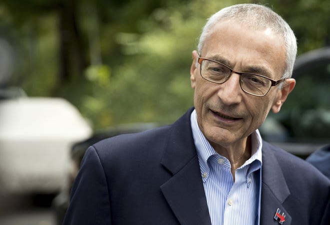 In this Oct. 5, Hillary Clinton campaign chairman John Podesta speaks to members of the media outside Clinton's home in Washington. The WikiLeaks organization on Oct. 7, posted what it said were thousands of emails from Podesta, including some with excerpts from speeches she gave to Wall Street executives and others — speeches she has declined to release despite demands from Trump. (Andrew Harnik/Associated Press)