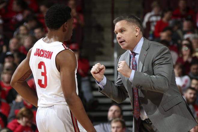 Ohio State Buckeyes Head Coach Chris Holtmann speaks with C.J. Jackson (3) during the game in the first half during the game against High Point Panthers at Value City Arena in Columbus on December 29, 2018. [Samantha Madar]