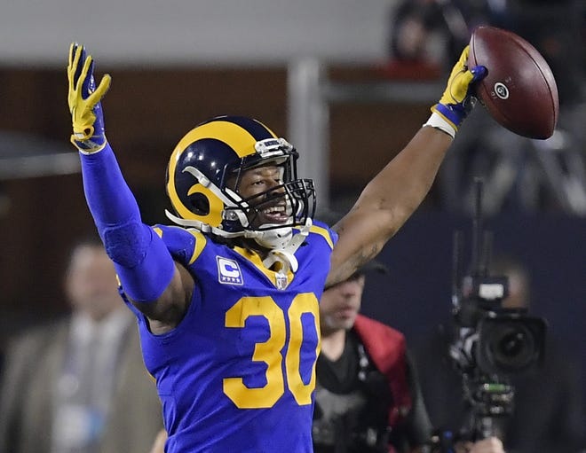 Los Angeles Rams running back Todd Gurley celebrates after scoring against the Dallas Cowboys during the first half in an NFL divisional playoff game in Los Angeles. [Mark J. Terrill/AP File]