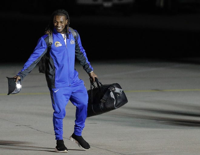 Los Angeles Rams defensive Nickell Robey-Coleman arrives at Hartsfield-Jackson Atlanta International Airport on Sunday night. Robey-Coleman and his teammates will be practicing at the Atlanta Falcons' training facility in preparation for the Super Bowl. [DAVID J. PHILLIP/THE ASSOCIATED PRESS]