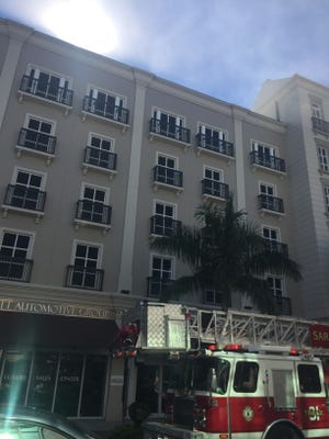The scene of a fire at the State Street Garage in downtown Sarasota on Tuesday. [Herald-Tribune staff photo / Barbara Peters Smith]