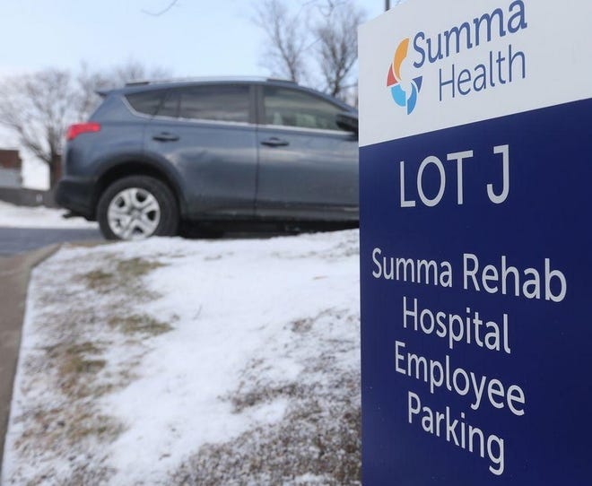 A woman who fell in a hospital parking lot wasn't discovered until nearly eight hours later. [PHIL MASTURZO/AKRON BEACON JOURNAL]