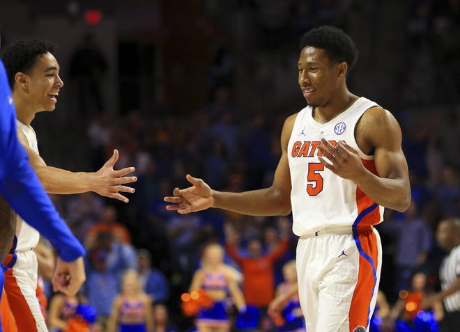 Florida guard KeVaughn Allen (5) led the Gators to Wednesday's overtime win against Ole Miss. [AP Photo/Matt Stamey]