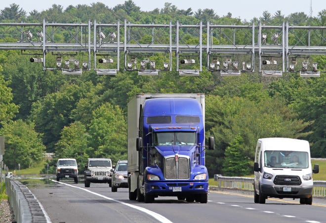 Truck-toll gantries came online in June on Route 95 in Exeter and Hopkinton. [The Providence Journal, file / Steve Szydlowski]