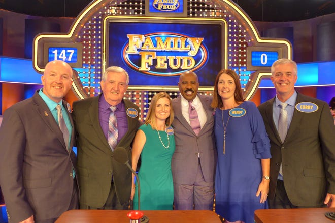 The Haneline siblings and their father take a moment from feuding to have a moment with Family Feud Host Steve Harvey. From left: Marty Haneline, Kimber Haneling, Amanda Jones, Wendy Hurst and Corby Haneline. [Special to The Star]