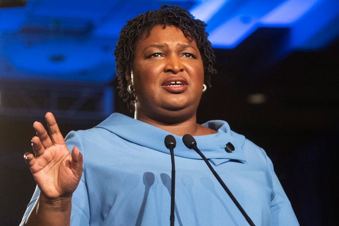 FILE - In this Nov. 6, 2018 file photo, Georgia Democratic gubernatorial candidate Stacey Abrams addresses supporters during an election night watch party in Atlanta. Senate Democratic Leader Charles Schumer says Abrams will deliver the Democratic response to President Donald Trump’s State of the Union address. (AP Photo/John Amis, File)