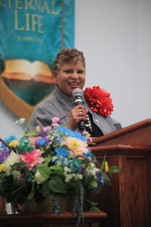 Pastor Helen Johnson-Robinson of Mount Olive AME Church speaks during the 2019 Alachua County Empowerment Revival at DaySpring Baptist Church in Gainesville. About 200 people gathered to listen to Johnson-Robinson the Voices of Empowerment Choir. [PHOTOS BY ANDREANNA HARDY/SPECIAL TO THE GUARDIANA]