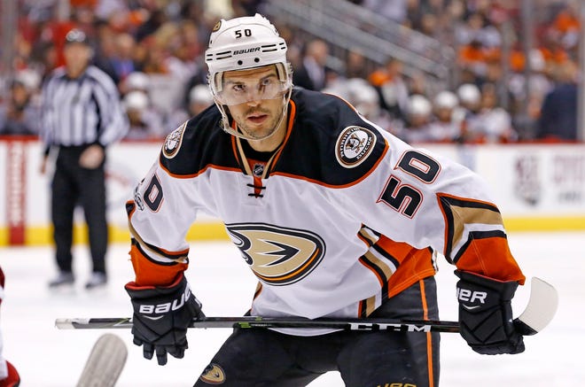 FILE - In this Jan. 14, 2017, file photo, Anaheim Ducks center Antoine Vermette pauses before a faceoff during the first period of an NHL hockey game against the Arizona Coyotes in Glendale, Ariz. Vermette announced his retirement Thursday, Jan. 31, 2019, after playing 14 NHL seasons and establishing himself as one of the best faceoff men of his generation. (AP Photo/Ross D. Franklin, FIle)