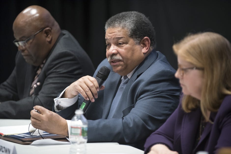Juan Cofield, center, president of the NAACP's New England Area Conference, spoke on a UNH panel in 2016. Cofield is to be in Dover next week to hold a press conference on the Dover School District decision to retain the teacher involved KKK jingle controversy late last year. [John Huff/Fosters.com, file]