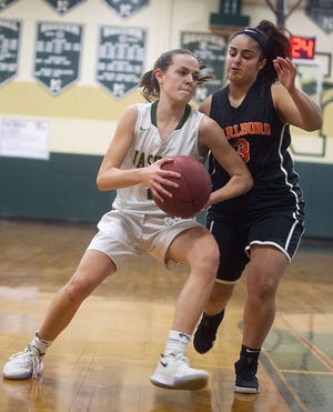 Marlborough's Celine Al-Nammari (right), pictured in a game against Nashoba earlier this season, led the Panthers to a win over Fitchburg on Thursday night. [Daily Nerws and Wicked Local Staff File Photo/Art Illman]