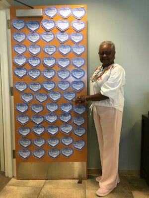 Sharon Martin shows off Hearts for Hospice that can be purchased in various locations around Cleveland County. All money goes to help hospice patients. [Special to The Star]