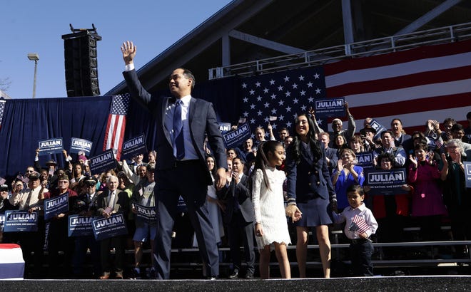Former San Antonio mayor Julián Castro waves as he arrives with his family to an event where he announced he will seek the 2020 Democratic presidential nomination, Jan. 12 in San Antonio. (AP PHOTO/ERIC GAY]