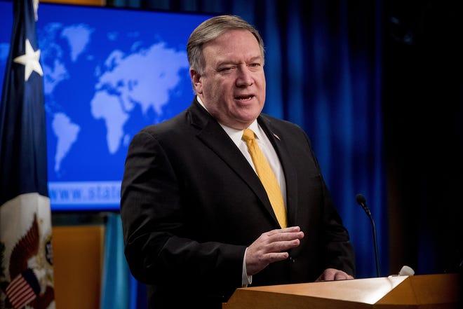 Secretary of State Mike Pompeo speaks at a news conference at the State Department in Washington Friday. Secretary of State Mike Pompeo has announced that the U.S. is pulling out of a treaty with Russia that's been a centerpiece of arms control since the Cold War. [ANDREW HARNIK/ASSOCIATED PRESS]