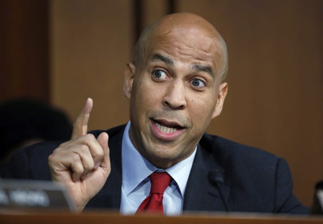 FILE - In this Sept. 6, 2018, file photo, Sen. Cory Booker, D-N.J., speaks on Capitol Hill in Washington. Booker on Friday declared his bid for the presidency in 2020 with a sweeping call to unite a deeply polarized nation around a "common purpose."

 (AP Photo/Alex Brandon, File)