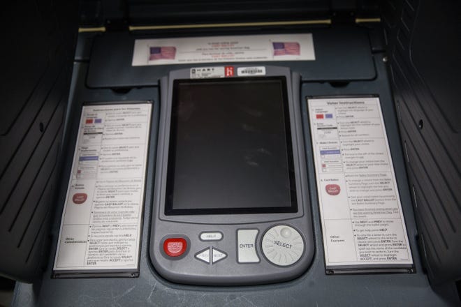 A Travis County voting booth in 2016. In a lawsuit filed Friday, the Mexican American Legal Defense and Educational Fund is seeking to block an investigation into alleged voter registration by non-U.S. citizens that the organization says is flawed. [AMERICAN-STATESMAN FILE PHOTO]
