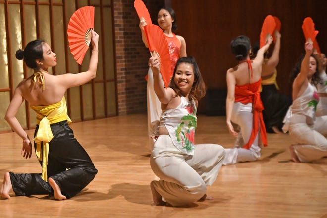 Knox College students perform a Vietnamese dance during the International Fair Cultural Showcase Saturday afternoon at Kresge Hall. [BILL NICE/The Register-Mail]