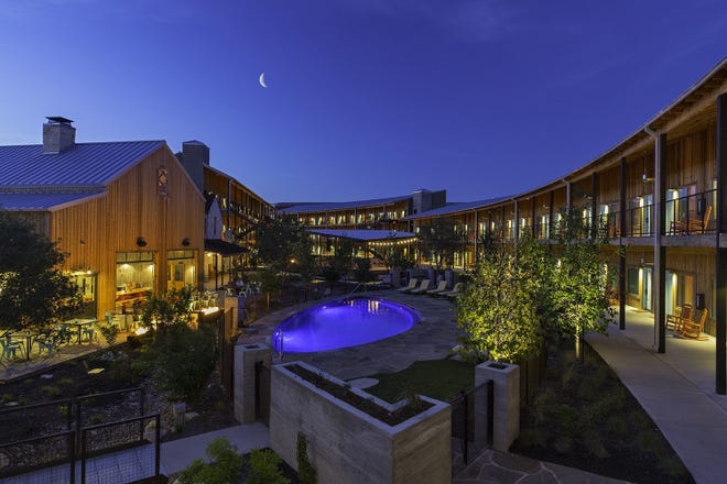 Lone Star Court features a relaxing courtyard with outdoor fire pits and a pool reminiscent of a Texas swimming hole. [Contributed by Lone Star Court]