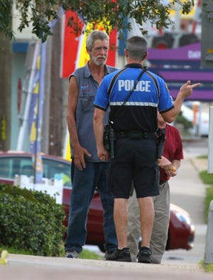 Daytona Beach adopted new panhandling rules Wednesday that threaten arrest and $200 fines for those who don't comply. Local leaders hope the tough new regulations end the two-year siege panhandlers have had on the city. [News-Journal file/Nigel Cook]